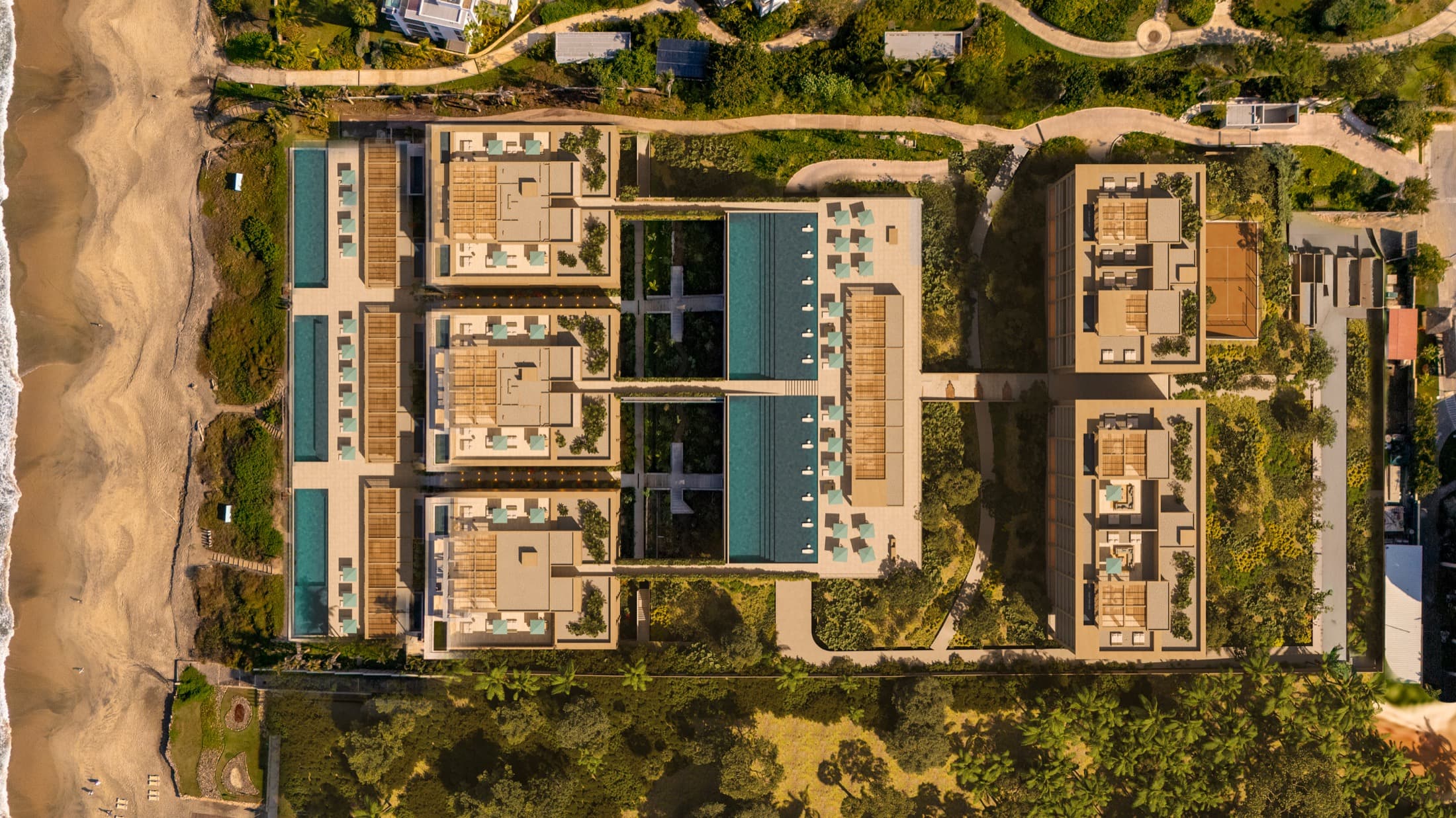 UAVI — straight-down aerial of all five towers, the pools and the beach